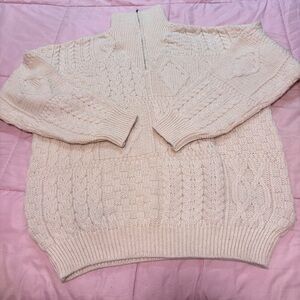Women's wool cable knit sweater from Aran Crafts, cream color.